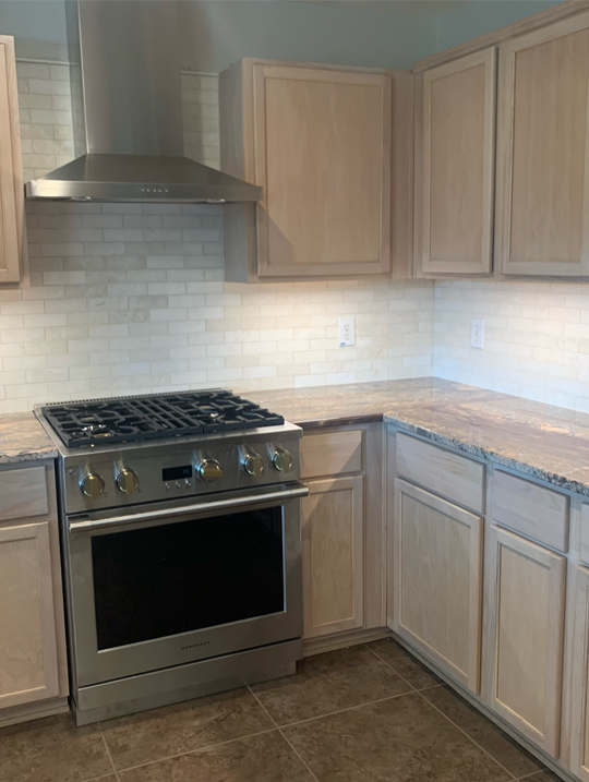 light brown tile backsplash installation, wfa's custom hardwood floors, houston texas